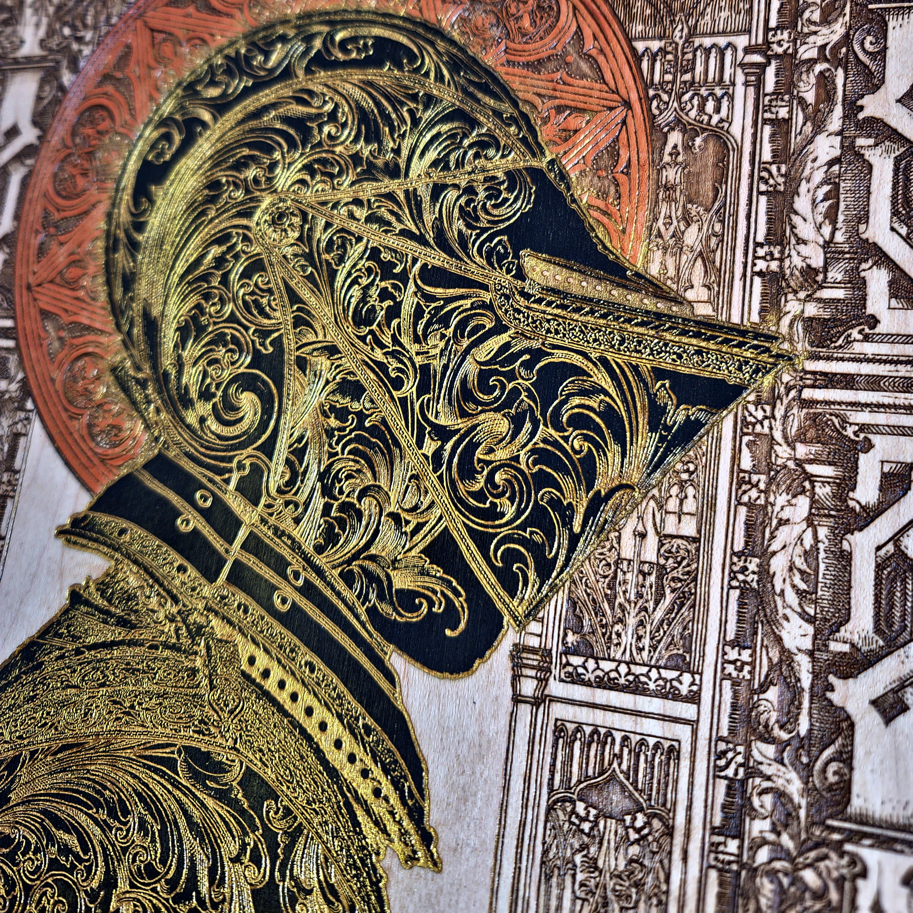 Black-and-gold medieval knight helmet maple wood wall art, close-up of the helmet profile and gold scrollwork