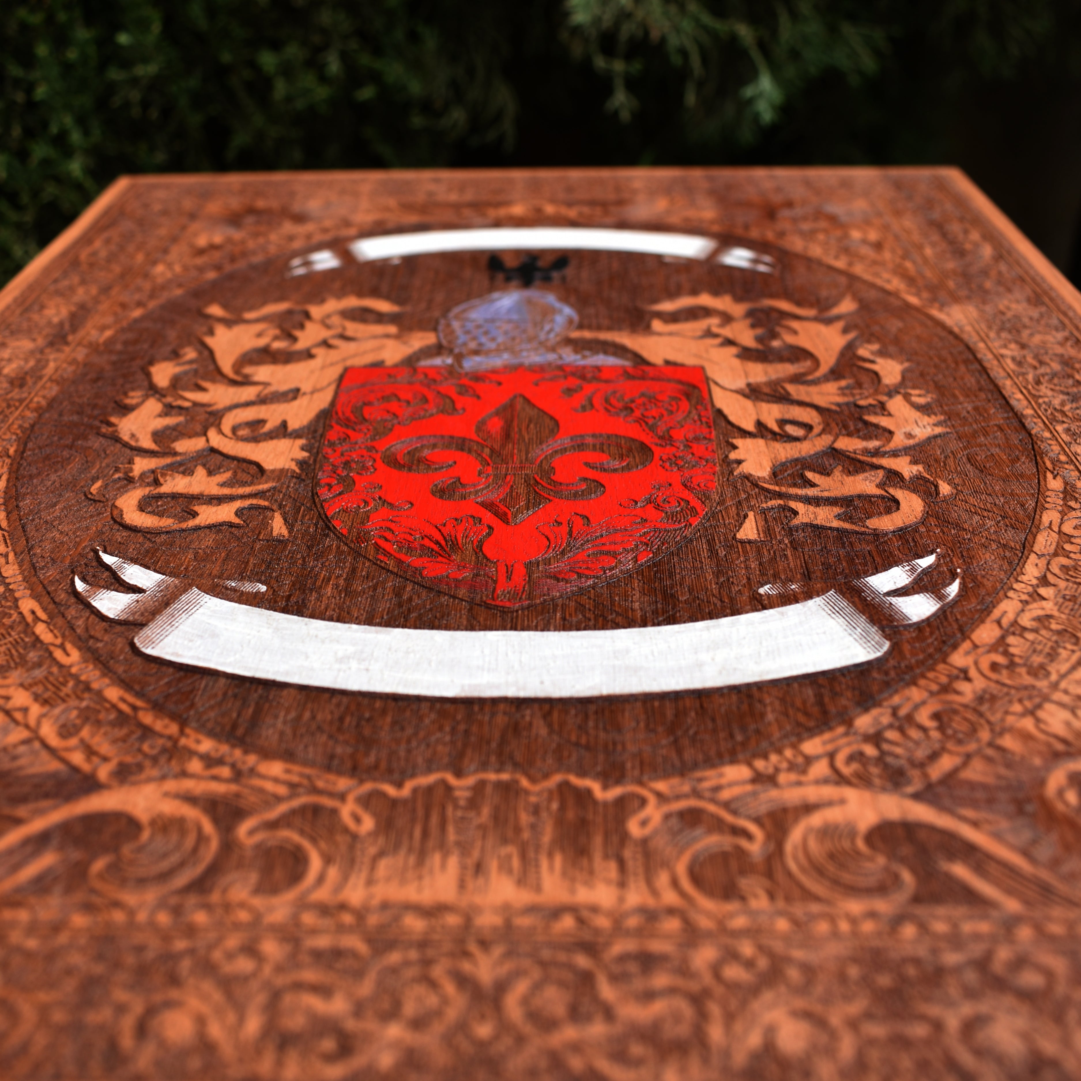 Engraved wooden crest artwork personalized with your family name.