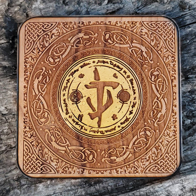 Hand-painted wooden wireless charger featuring Doom game symbol.