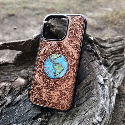 Laser-engraved Earth design on a wooden phone case, compatible with iPhone 16, iPhone 15, Galaxy S25, and more.