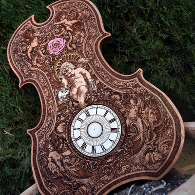 Handmade cedar wood violin-shaped clock with gothic patterns, hand-painted and laser-engraved. Functional, unique artwork perfect for collectors, music lovers, and gothic decor enthusiasts.