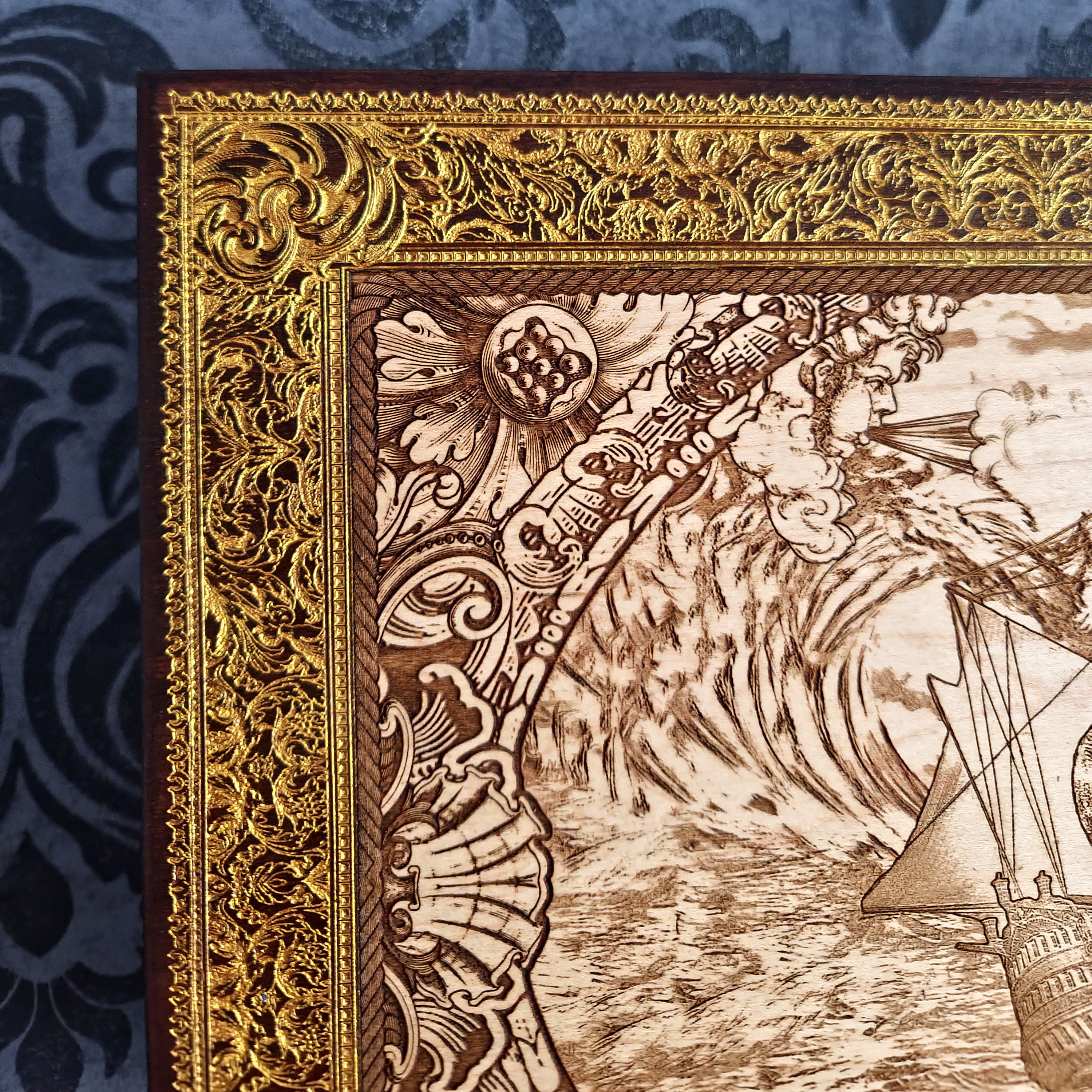 Extra-large Kraken engraved wood wall art, upper corner detail of the ornate frame and wave engraving