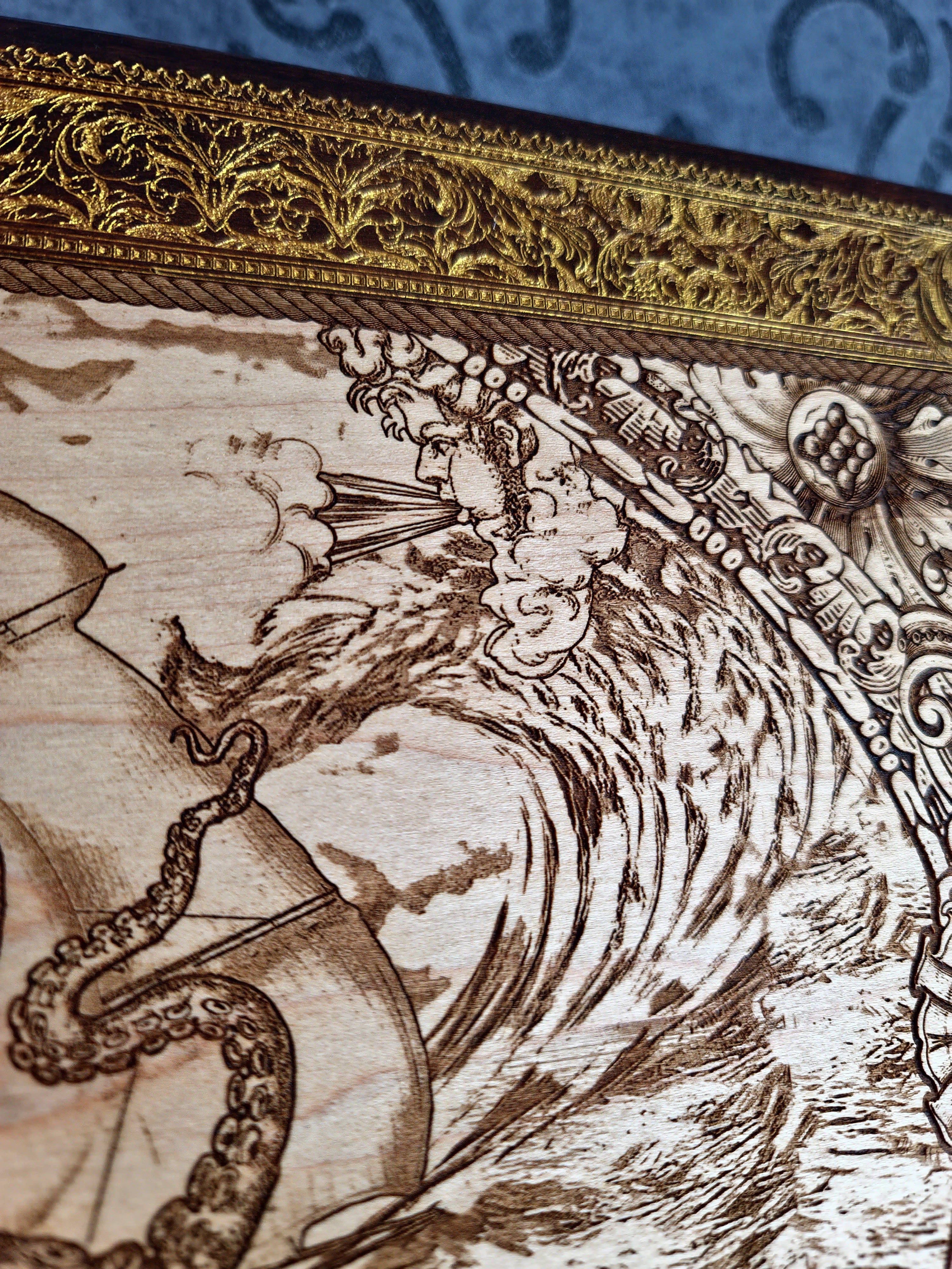 Extra-large Kraken engraved wood wall art, close-up of a curling tentacle and storm wave