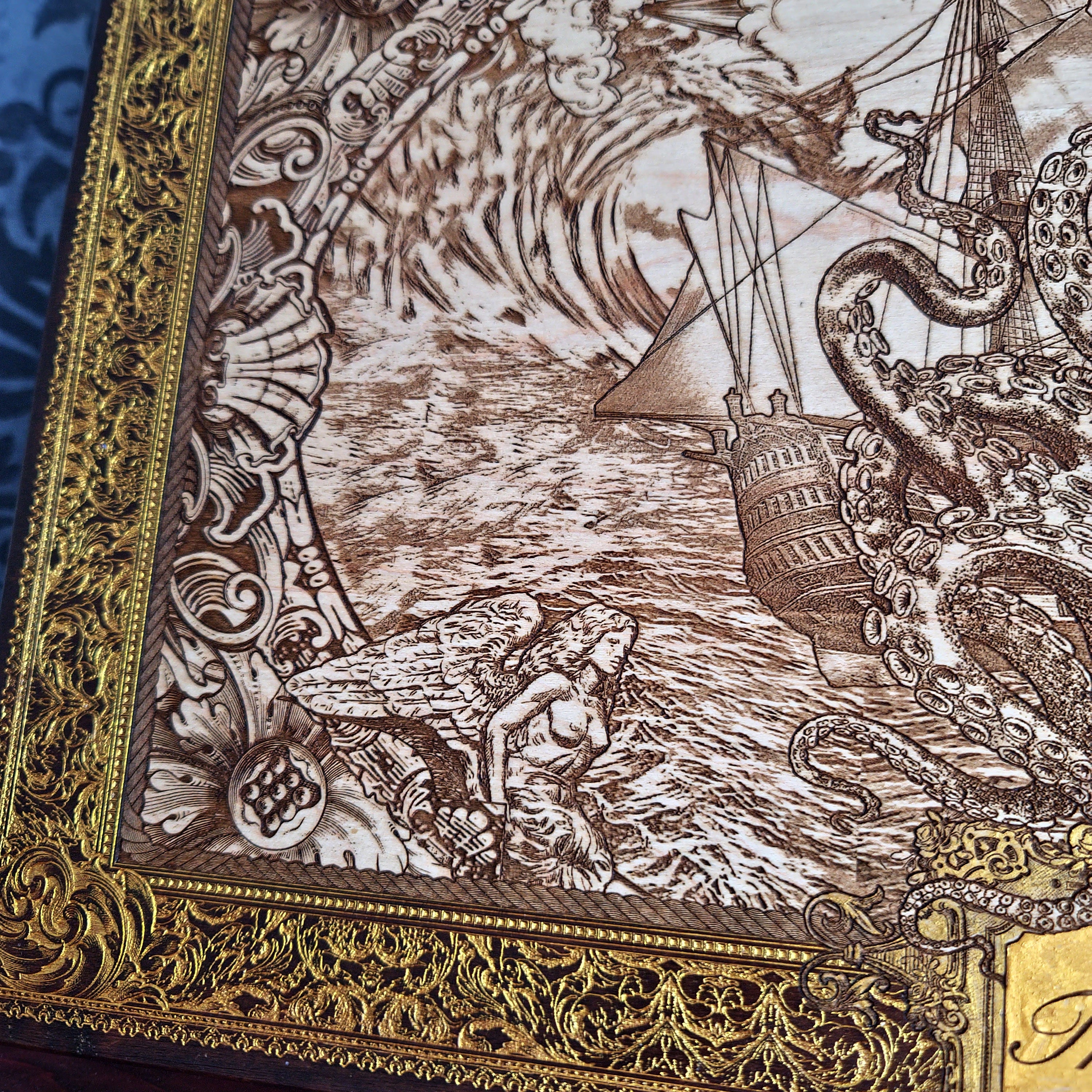 Extra-large Kraken engraved wood wall art, detail of a sailor, breaking wave and ship beside the frame