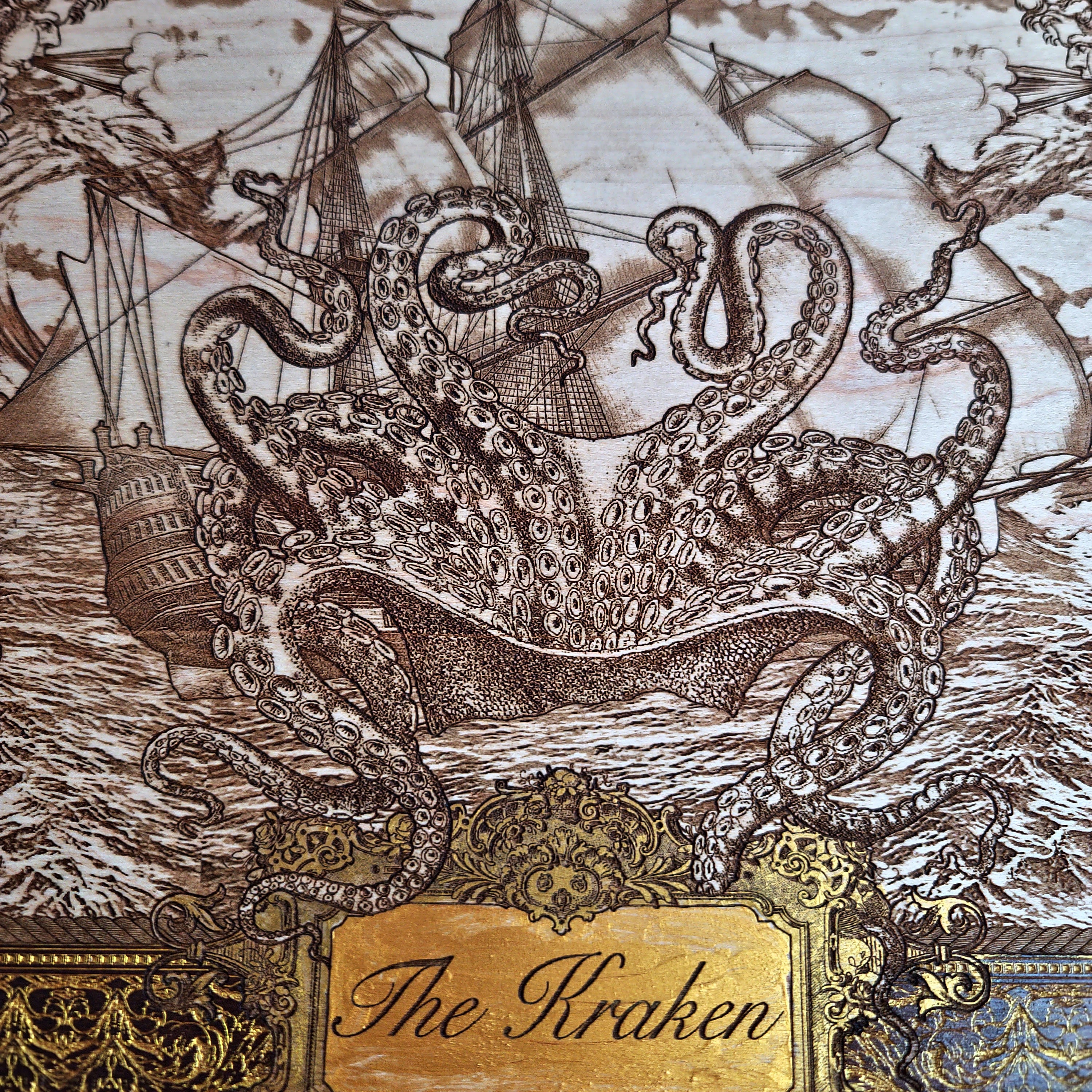 Extra-large Kraken engraved wood wall art, straight-on detail of the giant octopus and sailing ship