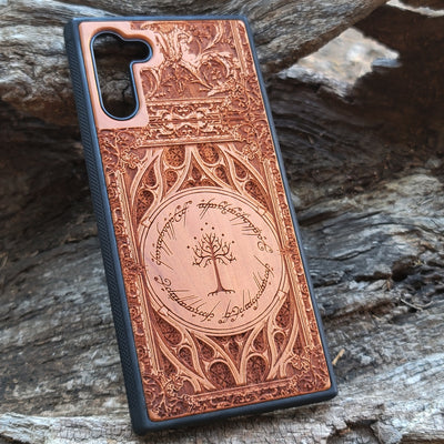 Gothic design wood phone case featuring intricate laser-engraved patterns inspired by Lord of the Rings. Compatible with iPhone , iPhone 15, 14, 13, 12, 11 Pro Max Mini, and Samsung Galaxy S, S24, S23, S22, S21, S20 Ultra, Plus, Note 20. Durable, slim, and stylish for Tolkien fans.