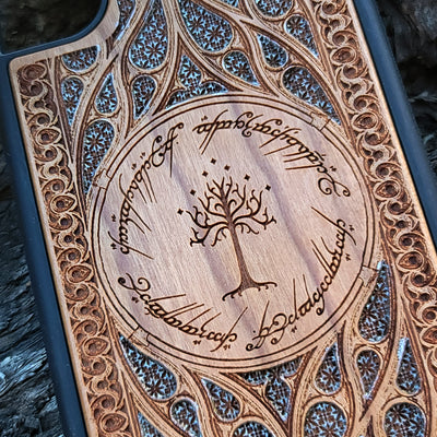 Lord of the Rings Gothic Design IV Silver wood phone case featuring intricate laser-engraved Gothic patterns. Compatible with iPhone , 15, 14, 13, 12, 11 Pro Max Mini, and Samsung Galaxy S, S24, S23, S22, S21, S20 Ultra Plus, Note 20. A unique and protective accessory for fans of the Lord of the Rings series.