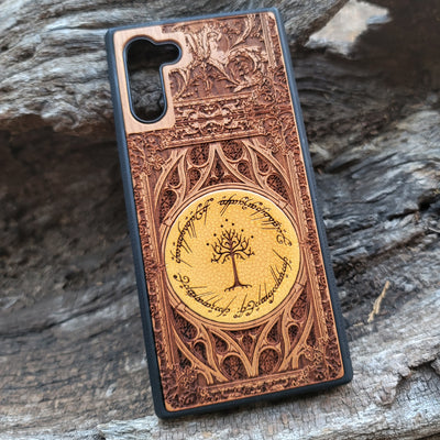 Handcrafted LOTR-inspired wooden phone case with engraved elvish script and rune symbols