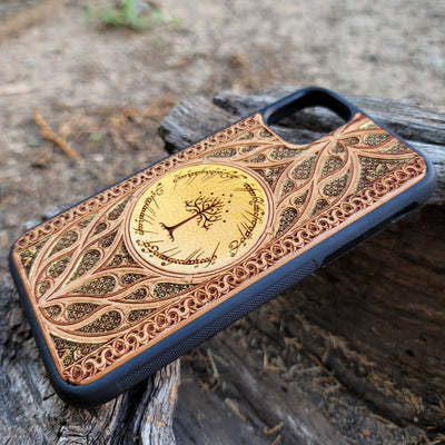 Gothic Lord of the Rings wood phone case featuring a laser-engraved detailed design inspired by Tolkien’s universe. Compatible with iPhone , 15, 14, 13, 12, 11 Pro Max Mini, and Samsung Galaxy S, S24, S23, S22, S21, S20 Ultra, Plus, Note 20. Unique, stylish, and durable for LOTR enthusiasts.