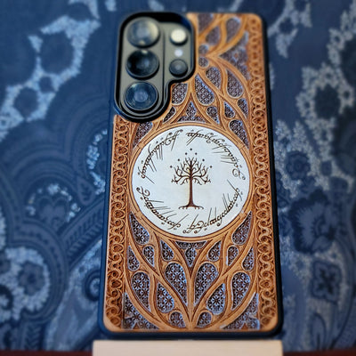 Wooden phone case for iPhone and Samsung Galaxy featuring a runic inscription and Gothic pattern design, laser-engraved for a unique look. Slim, durable, and compatible with iPhone 17, 16, 15, 14, 13, 12, 11 Pro Max Mini, and Samsung Galaxy S26, S25, S24, S23, S22, S21, S20 Ultra, Plus, Note 20. Order now for a stylish and functional phone upgrade!
