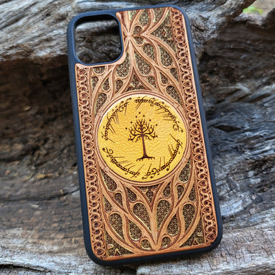 Gothic Lord of the Rings wood phone case featuring a laser-engraved detailed design inspired by Tolkien’s universe. Compatible with iPhone , 15, 14, 13, 12, 11 Pro Max Mini, and Samsung Galaxy S, S24, S23, S22, S21, S20 Ultra, Plus, Note 20. Unique, stylish, and durable for LOTR enthusiasts.