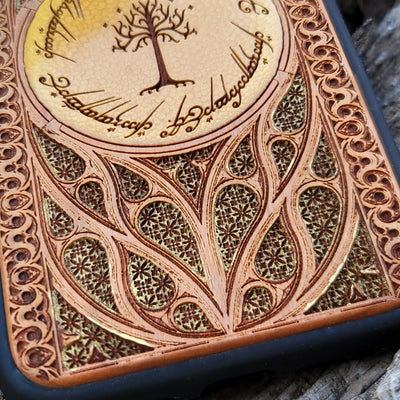 Gothic Lord of the Rings wood phone case featuring a laser-engraved detailed design inspired by Tolkien’s universe. Compatible with iPhone , 15, 14, 13, 12, 11 Pro Max Mini, and Samsung Galaxy S, S24, S23, S22, S21, S20 Ultra, Plus, Note 20. Unique, stylish, and durable for LOTR enthusiasts.
