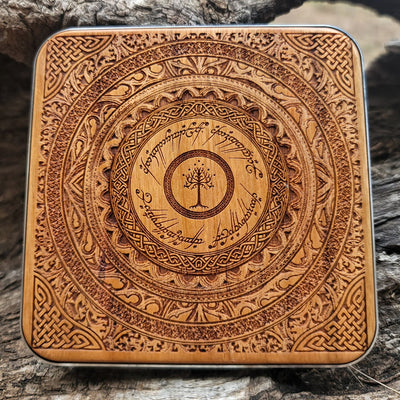 Overhead view of One Ring inscription painted on wood charger.