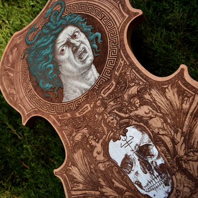 Limited edition Medusa artwork engraved on cedar wood violin silhouette.