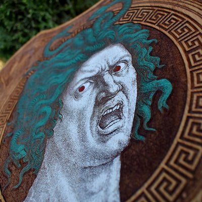 Gothic violin wall plaque featuring Medusa engraving, limited edition art.