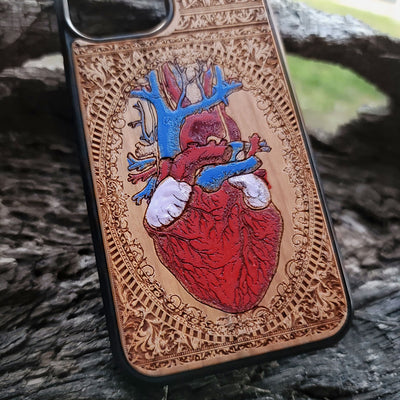 Protective wooden phone case for iPhone, handcrafted with engraved designs. Fits iPhone -11 Pro Max. Durable and eco-friendly.