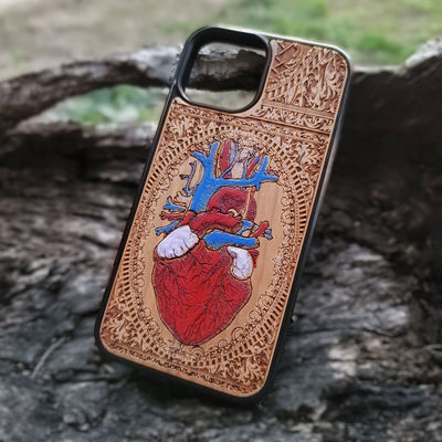 Protective human heart wooden phone case for iPhone, handcrafted with engraved designs. Fits iPhone -11 Pro Max. Samsung Galaxy S - S21 Ultra Plus. Durable and eco-friendly.
