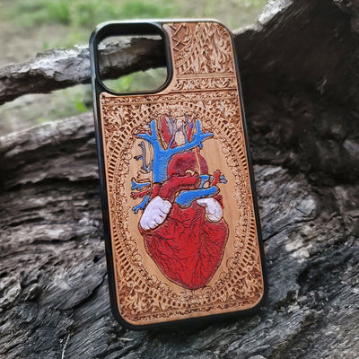 Protective human heart wooden phone case for iPhone, handcrafted with engraved designs. Fits iPhone -11 Pro Max. Samsung Galaxy S - S21 Ultra Plus. Durable and eco-friendly.