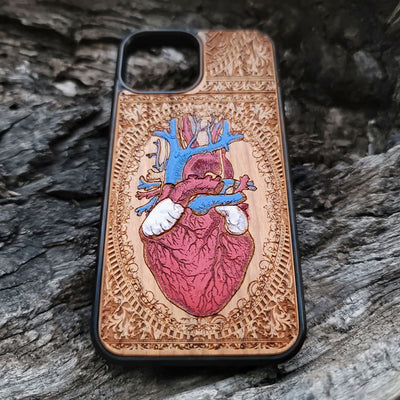 Protective wooden phone case for iPhone, handcrafted with engraved designs. Fits iPhone -11 Pro Max. Durable and eco-friendly.