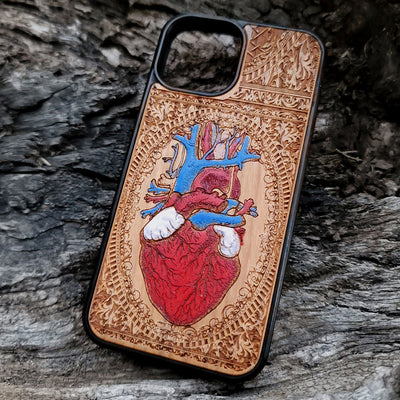 Protective human heart wooden phone case for iPhone, handcrafted with engraved designs. Fits iPhone -11 Pro Max. Samsung Galaxy S - S21 Ultra Plus. Durable and eco-friendly.