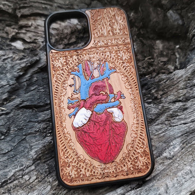 Protective human heart wooden phone case for iPhone, handcrafted with engraved designs. Fits iPhone -11 Pro Max. Samsung Galaxy S - S21 Ultra Plus. Durable and eco-friendly.