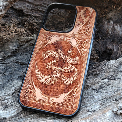 Gothic wood phone case featuring the OM Aum Reiki symbol, intricately laser-engraved for a unique and spiritual design. Compatible with iPhone , 15, 14, 13, 12, 11 Pro Max Mini, and Samsung Galaxy S, S24, S23, S22, S21, S20 Ultra Plus, Note 20. A perfect blend of style, spirituality, and protection.