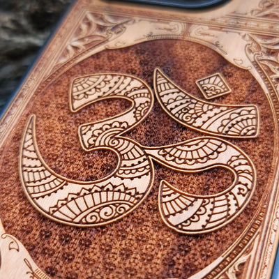Gothic wood phone case featuring the OM Aum Reiki symbol, intricately laser-engraved for a unique and spiritual design. Compatible with iPhone , 15, 14, 13, 12, 11 Pro Max Mini, and Samsung Galaxy S, S24, S23, S22, S21, S20 Ultra Plus, Note 20. A perfect blend of style, spirituality, and protection.