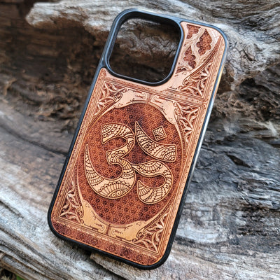Gothic wood phone case featuring the OM Aum Reiki symbol, intricately laser-engraved for a unique and spiritual design. Compatible with iPhone , 15, 14, 13, 12, 11 Pro Max Mini, and Samsung Galaxy S, S24, S23, S22, S21, S20 Ultra Plus, Note 20. A perfect blend of style, spirituality, and protection.