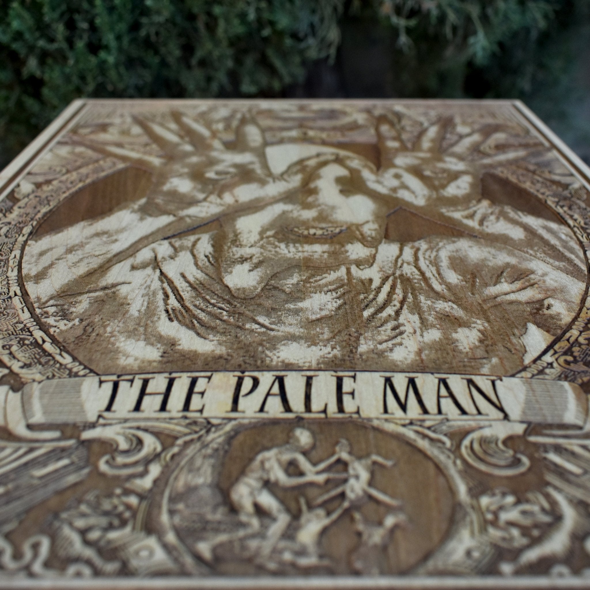 Guillermo del Toro Pale Man creature engraved on wood
