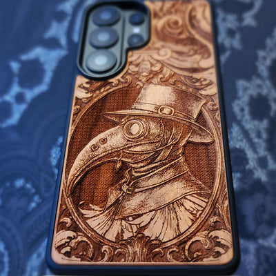 Deep laser engraved wooden phone case featuring a gothic Plague Doctor design on natural wood for iPhone and Samsung Galaxy.