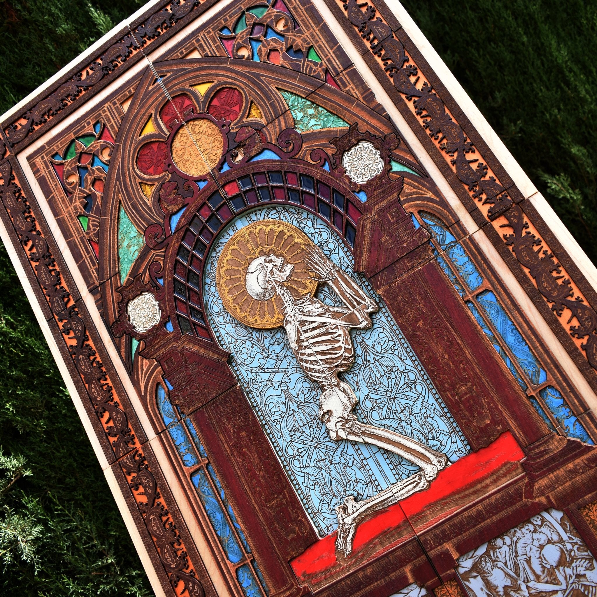 Large praying skeleton wood wall art with dark gothic style and engraved details.