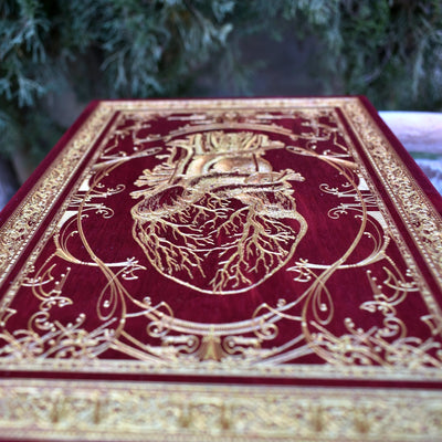 Medical heart illustration engraved in red on cherrywood, gothic wall decor.