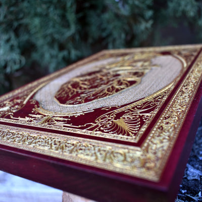 Laser-engraved red heart artwork on wood, perfect for dark home decor.
