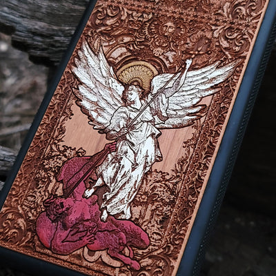 St. Michael the Archangel wooden phone case, hand-painted and laser-engraved on cherrywood. Compatible with iPhone -11 Pro Max, Galaxy S-S20. Religious-inspired phone case.