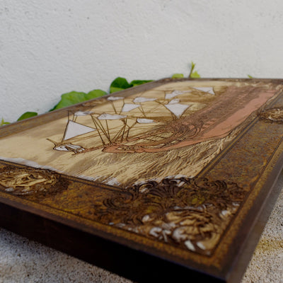 Engraved wooden wall art with detailed sailing ship design, nautical maritime home décor