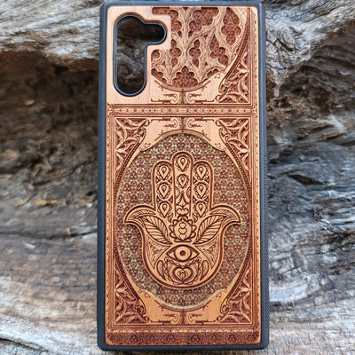 Hand-painted Hamsa Hand symbol wood phone case with Gothic pattern for iPhone & Samsung Galaxy. Laser-engraved design offers durability and style, compatible with iPhone , 15, 14, 13, 12, 11 Pro Max Mini & Samsung Galaxy S, S24, S23, S22, S21, S20 Ultra Plus Note 20.