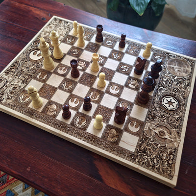 Handmade wood chess board featuring starships, helmets and futuristic engraved symbols