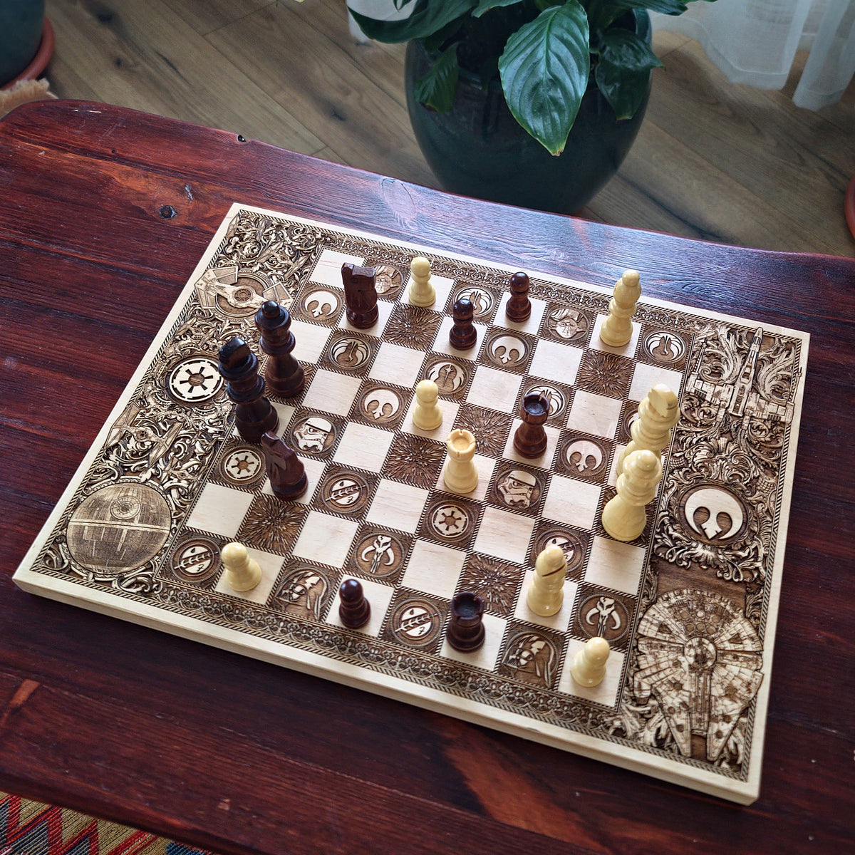 Engraved wooden star wars
chessboard with detailed galactic symbols and space battle artwork