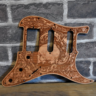 Fender Stratocaster cherry wood pickguard with laser-engraved human skull design