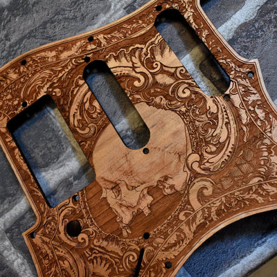 Handcrafted wooden pickguard for Fender Stratocaster – human skull laser engraving