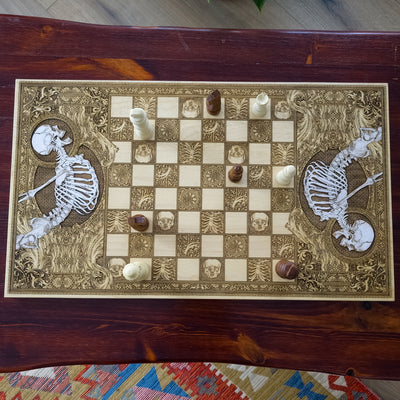 Wooden chessboard with laser-engraved and hand-painted skeleton designs