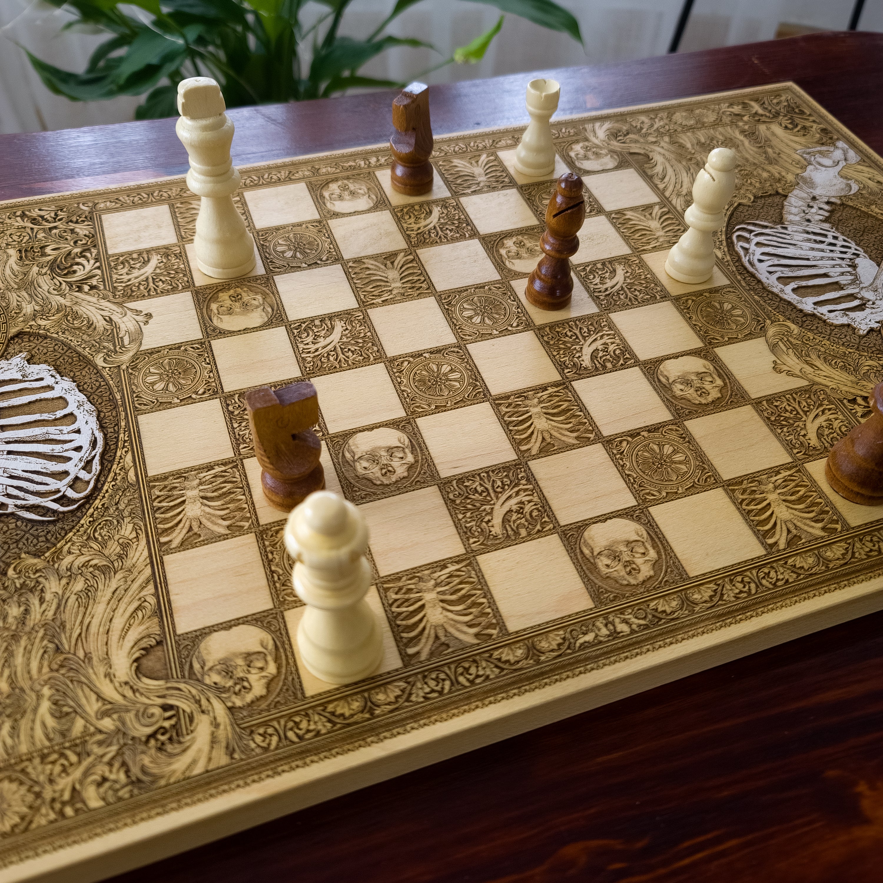Artistic skeleton-themed wooden chessboard, hand painted