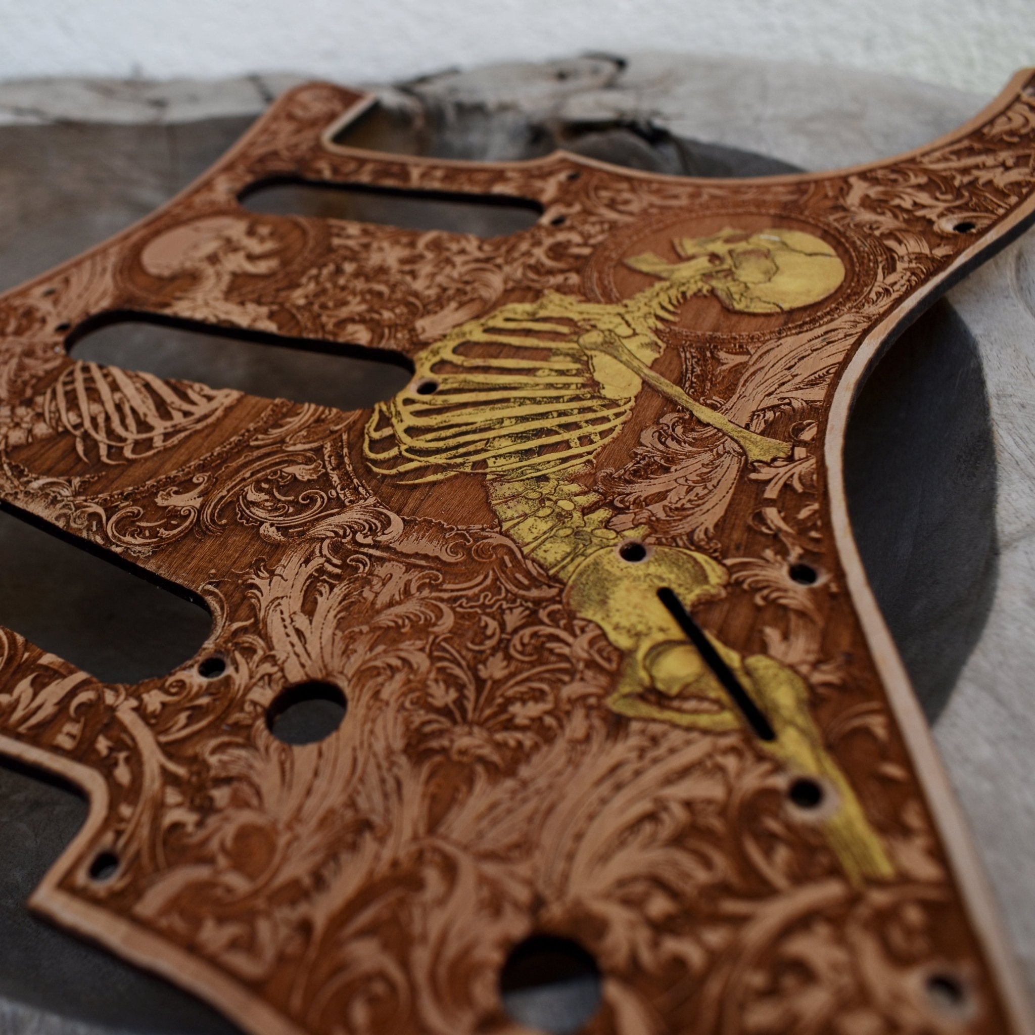 Stratocaster HSS & SSS Wood Pickguard - Stumble Hand Painted Gold – gothic art, engraved wood, dark fantasy, skeleton design, artisan