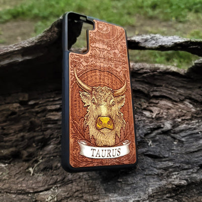 Handcrafted wood phone cover featuring Taurus bull symbol