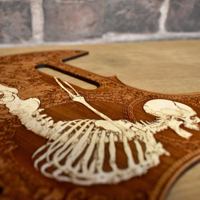 8-hole cherry wood pickguard for Fender Telecaster with laser-engraved skull artwork
