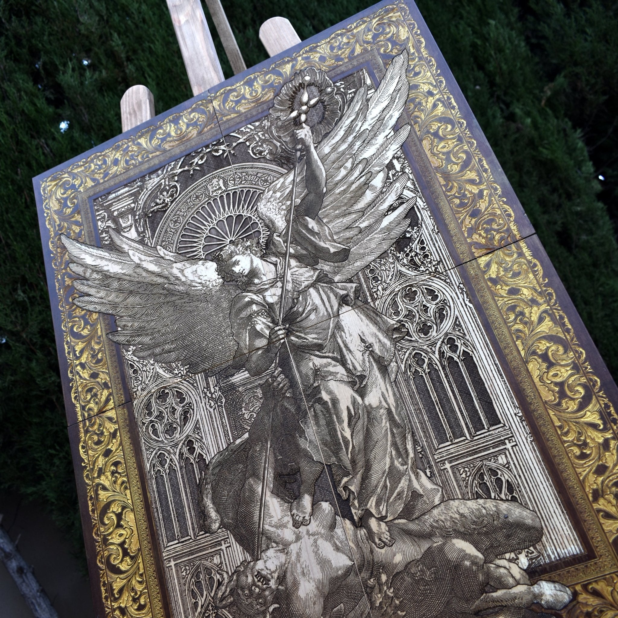 Engraved wooden masterpiece of St. Michael placed on a stand, ideal for altars or sacred spaces.