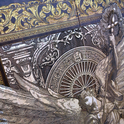 Angled perspective showing the depth of the engraving and the rich tones of stained maple wood.