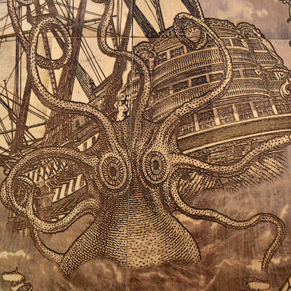 Engraved woodcut wall art of Kraken sea monster attacking sailing boat, nautical maritime décor