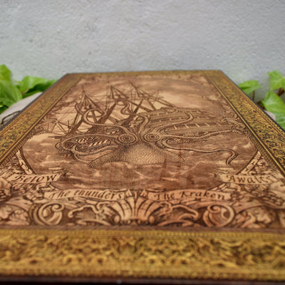 Woodcut wall art engraved with Kraken sea monster attacking sailing ship, nautical maritime décor