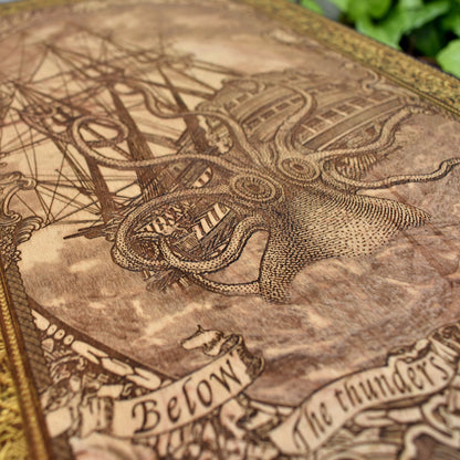 Woodcut wall art engraved with Kraken sea monster attacking sailing ship, nautical maritime décor